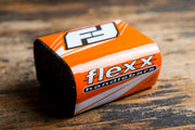 Orange steering damper crossbar pad for Flexx Handlebars.  